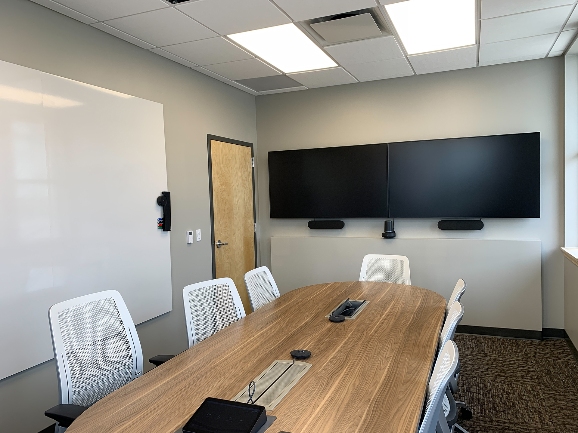 Turnaround Building Construction - small conference room by The McDonnel Group
